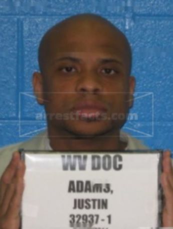 Justin S Adams