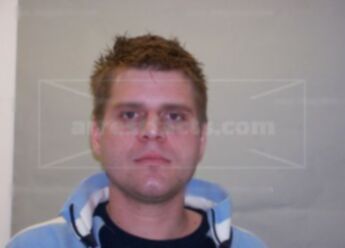 Bradley J Neumann