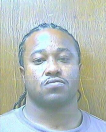 Earnest E Green