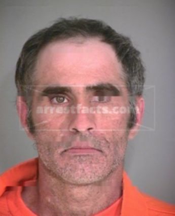 Travis J Hampton