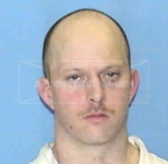 Travis J Frederickson