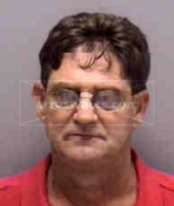 Timothy J Battis