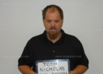 Nicholas A Toth