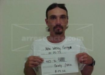 John W Grigg