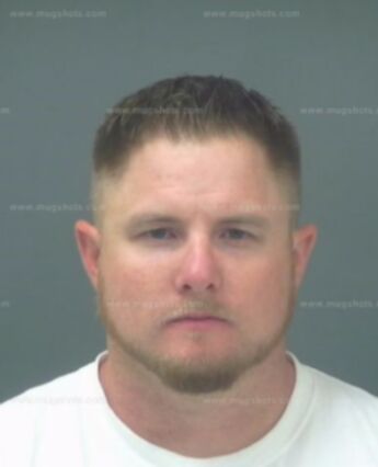 Travis Reed Holcomb