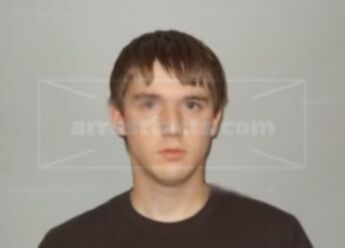 Tyler J Burkett