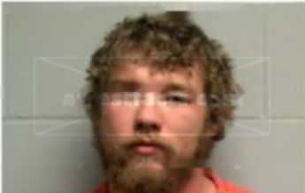 Travis J Hanson