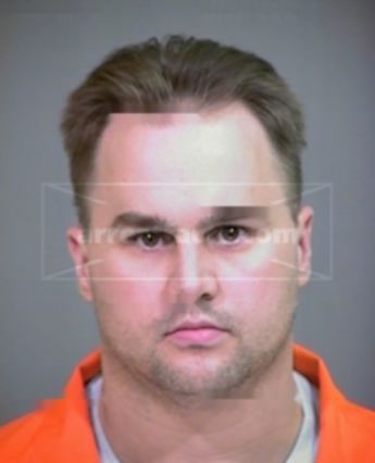 Christopher M Adams