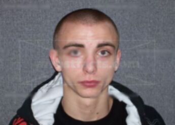 Corey J Tschan