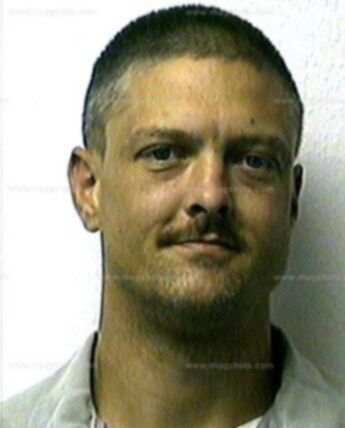 Travis J Whitener