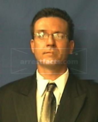Timothy L Adcock