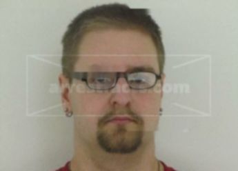 Adam K Suggs