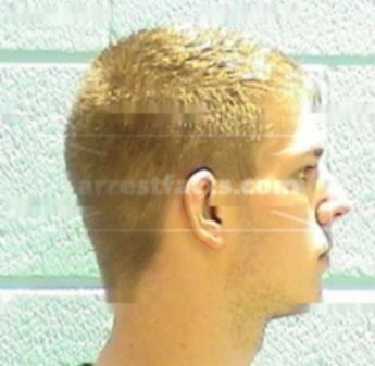 Travis L. King