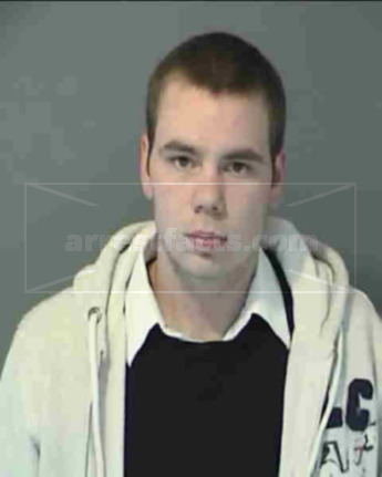 Dustin J Troyer