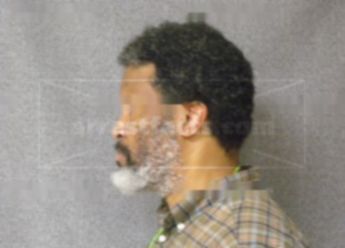 John P Sims