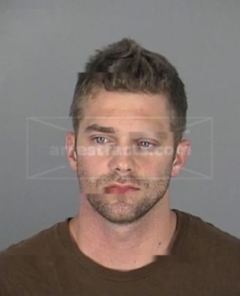 Travis F Powers