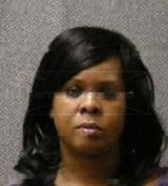 Kimberly E Miller