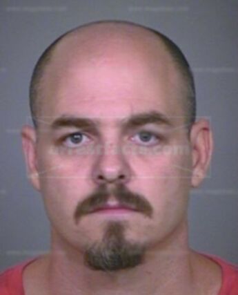 Justin L Huenefeld