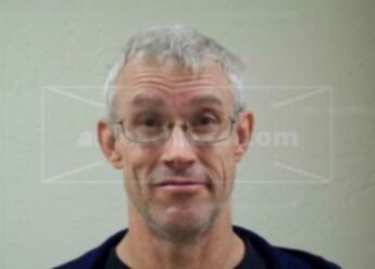 Christopher P Adams