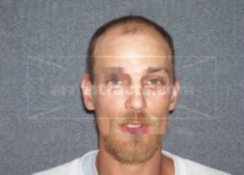 Travis L Tennant