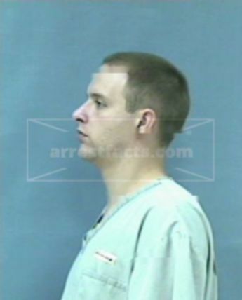 Travis J Merritt