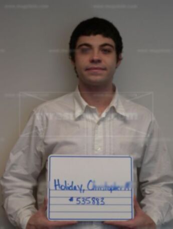 Christopher M Holiday