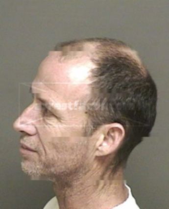 Wilfred L Schneider