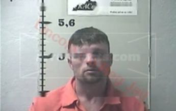 Adam T Riddle