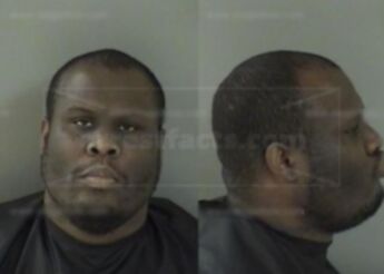 Travis J Whitfield