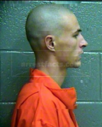 Justin L Cox