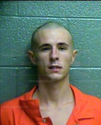 Justin L Cox