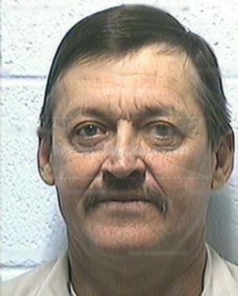 Travis L Wigington