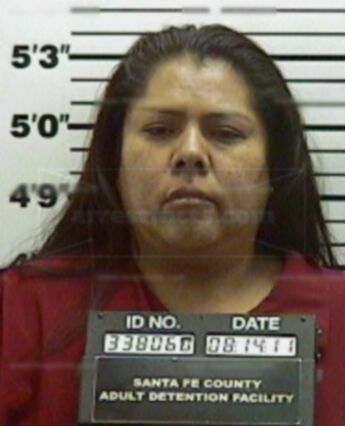 Angela J Vigil
