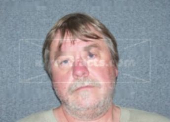Dennis R Tuttle