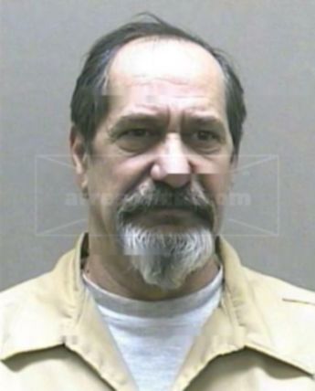 John J Korman