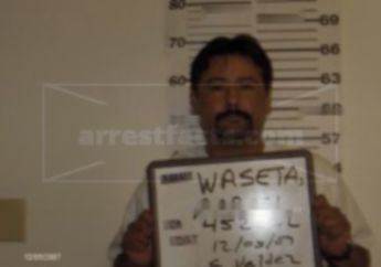 Aaron C Waseta