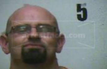 Derrick C Risinger