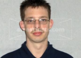 Adam J Longstreth