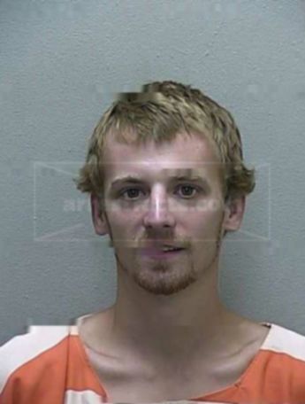 Justin D Wells