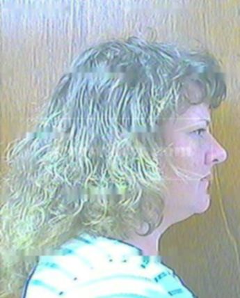 Carolyn J Adams
