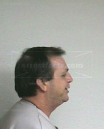 Dennis R Poulson