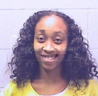 Tenisha M Triplett