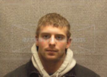 Michael E West