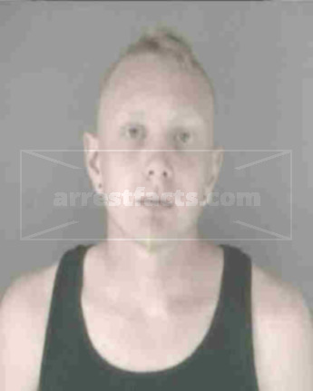 Justin T Schroer