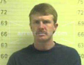 Gregory A West