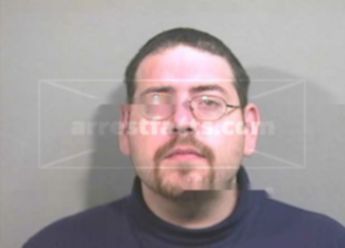 Aaron J Wolfe