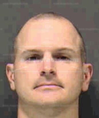 Eric M Schenk