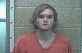 Andrew D Tumey