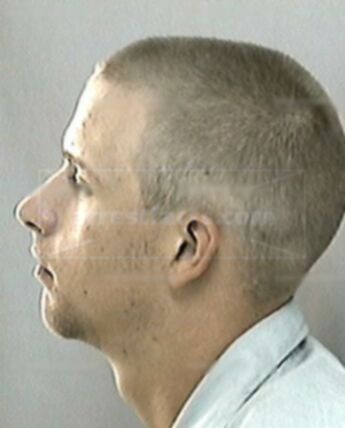 Travis J Merritt