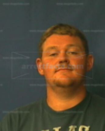 Jon L Tuggle